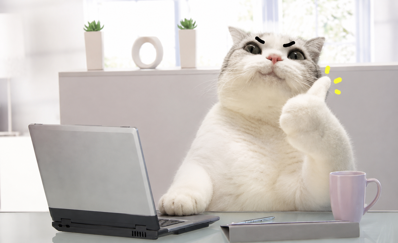 TITAN at a laptop in an office