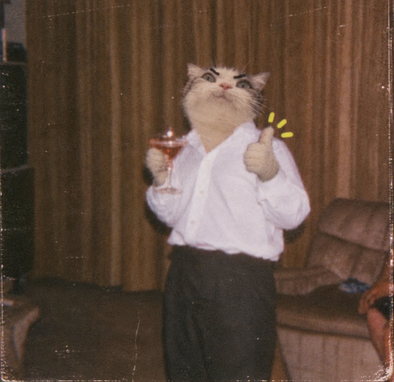TITAN in a suit holding a martini